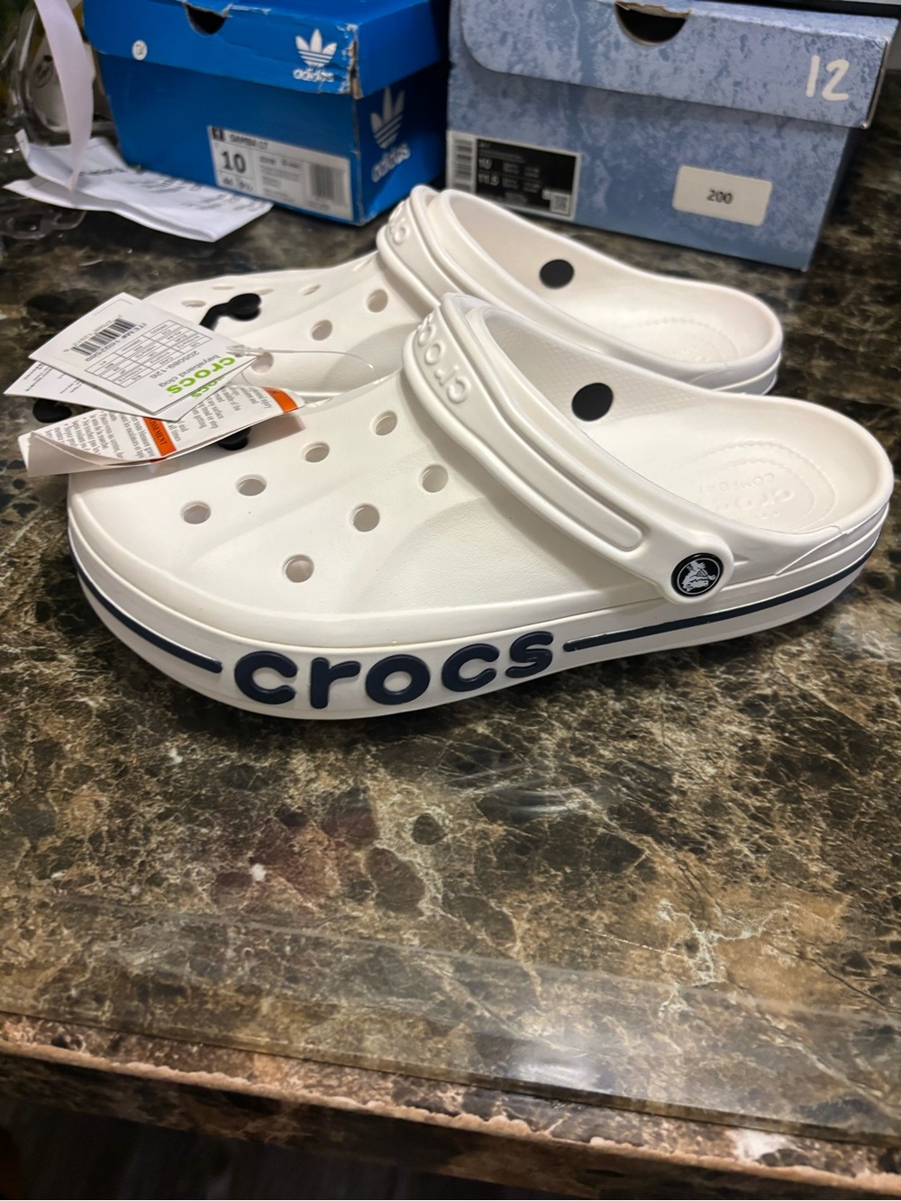 Crocs Men’s Classic White Clogs with Black Logo